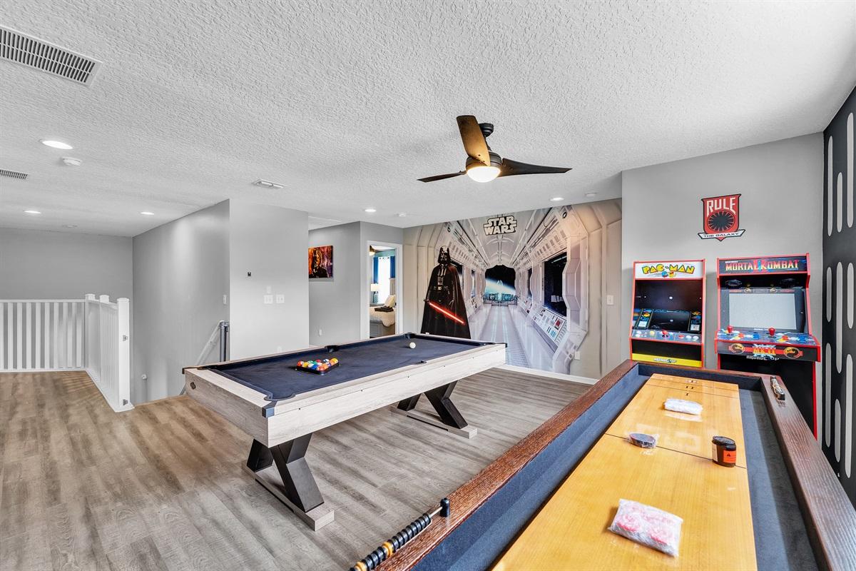 • "A galaxy of fun awaits in our Star Wars game room! Unleash the Force with foosball, arcade games, and décor from a galaxy far, far away. Ideal for young Padawans and Jedi Masters alike." • "Enter a world of interstellar entertainment where epic battles