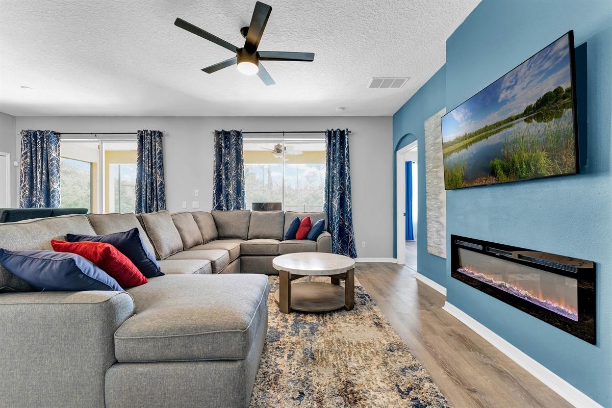 Family room with 58" Tv and Fireplace